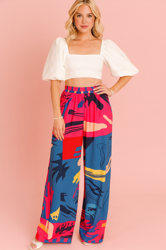 Daliah pants in a red, blue and black print