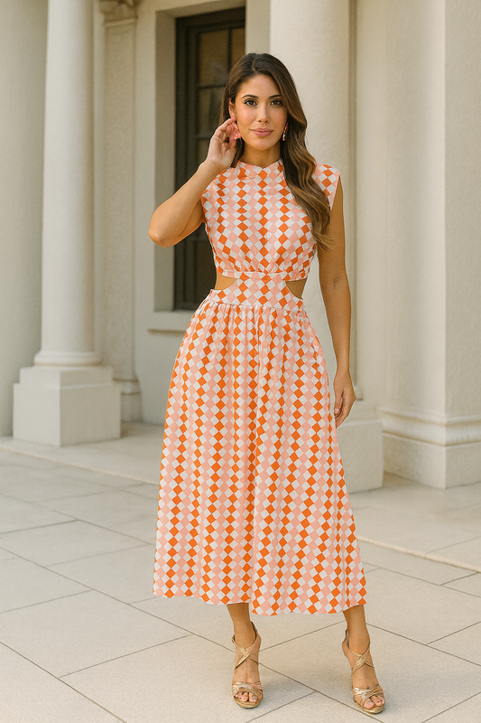 Savanna cut out retro print in asymmetrical print in orange and pink midi dress
