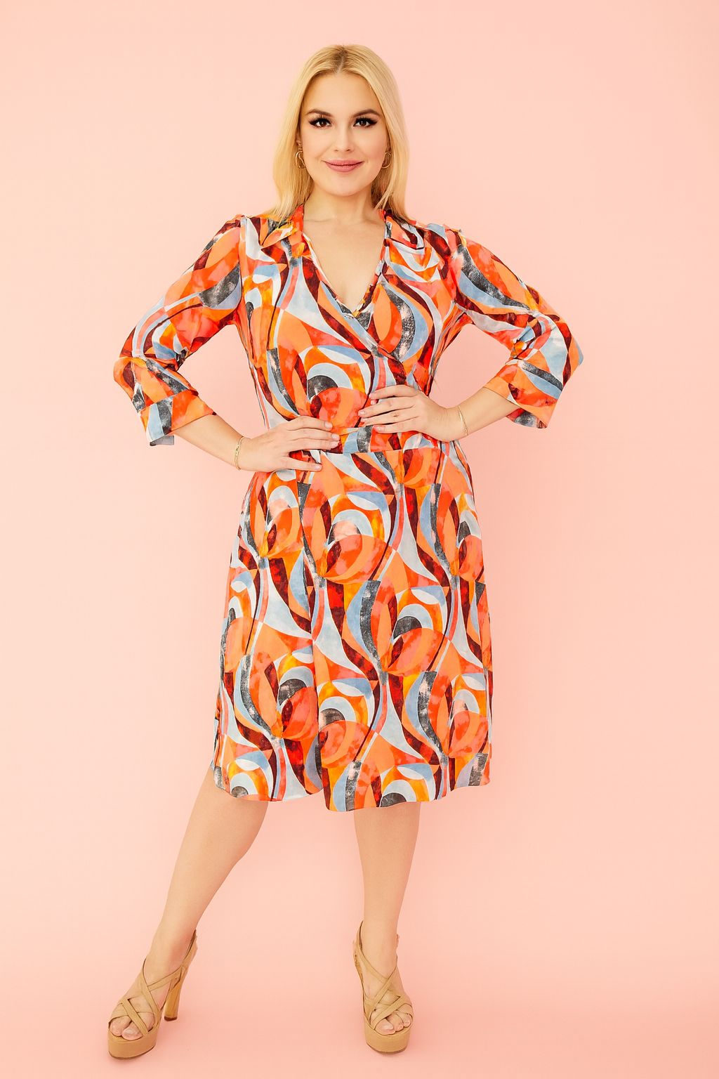 Cher faux wrap dress in an abstract orange print