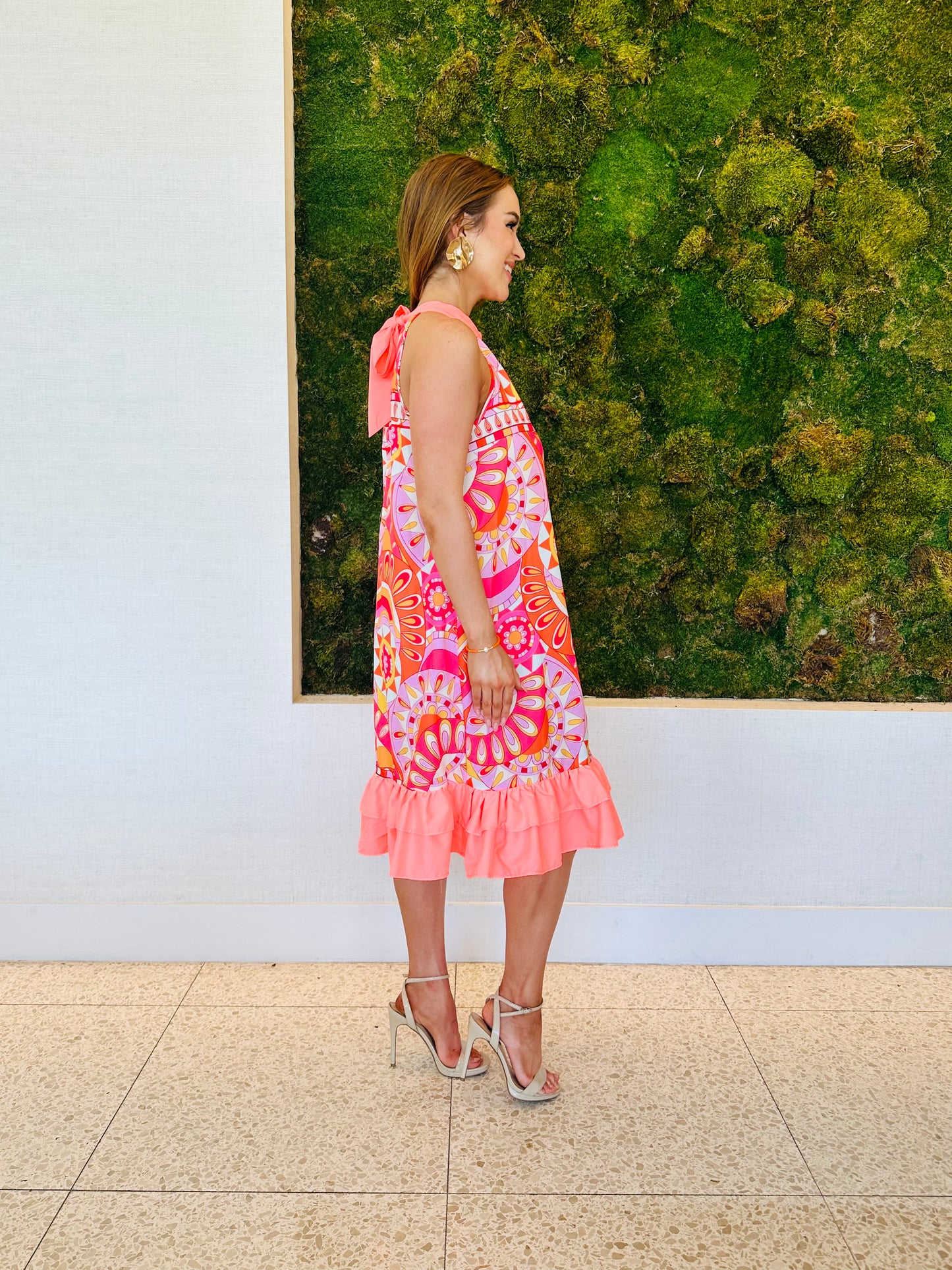 Norah asymmetrical orange print dress with a flare bottom