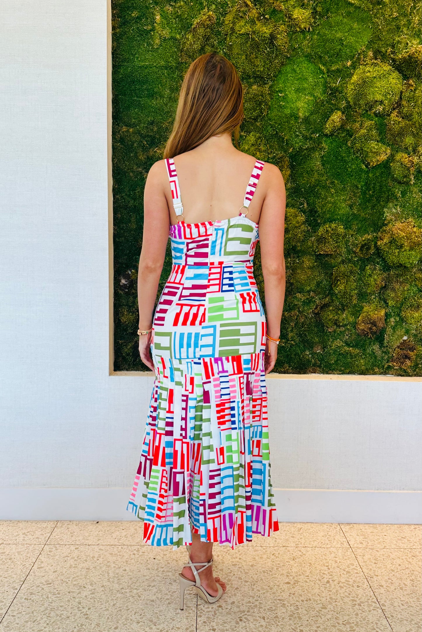 Galia white mermaid fit dress with a bottom flare midi