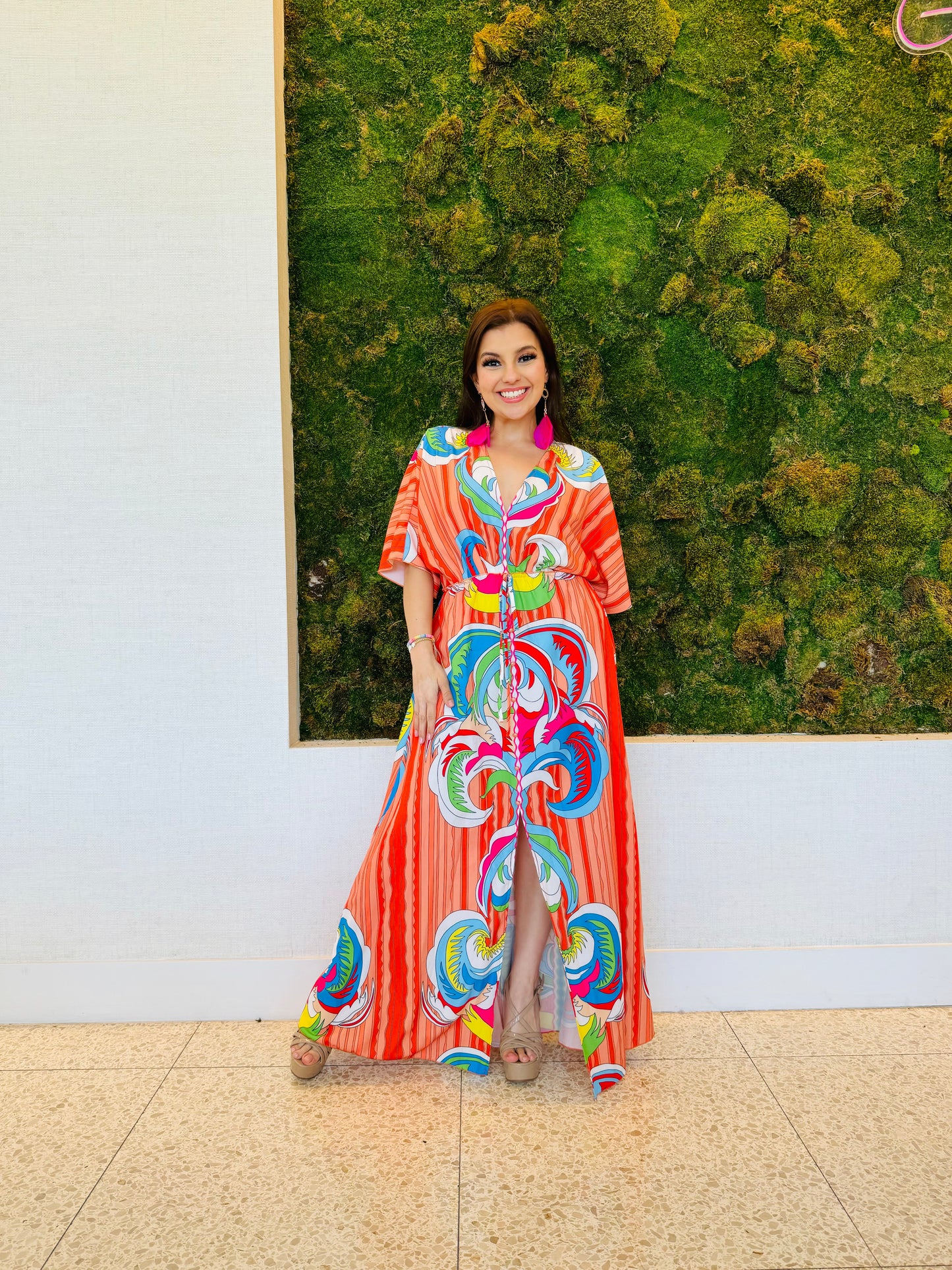 Raquel A line V neck maxi dress in an abstract orange print