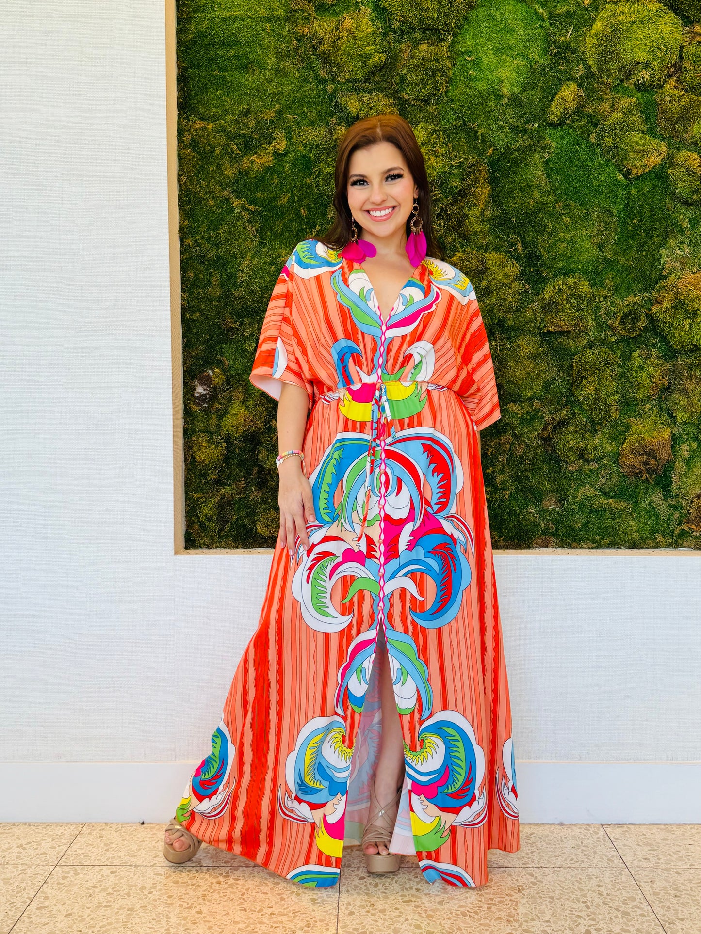 Raquel A line V neck maxi dress in an abstract orange print