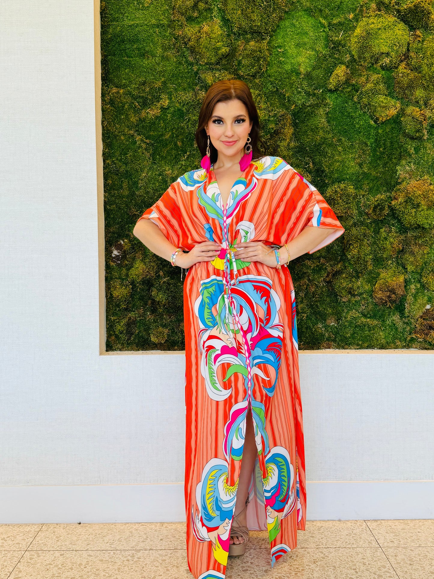 Raquel A line V neck maxi dress in an abstract orange print