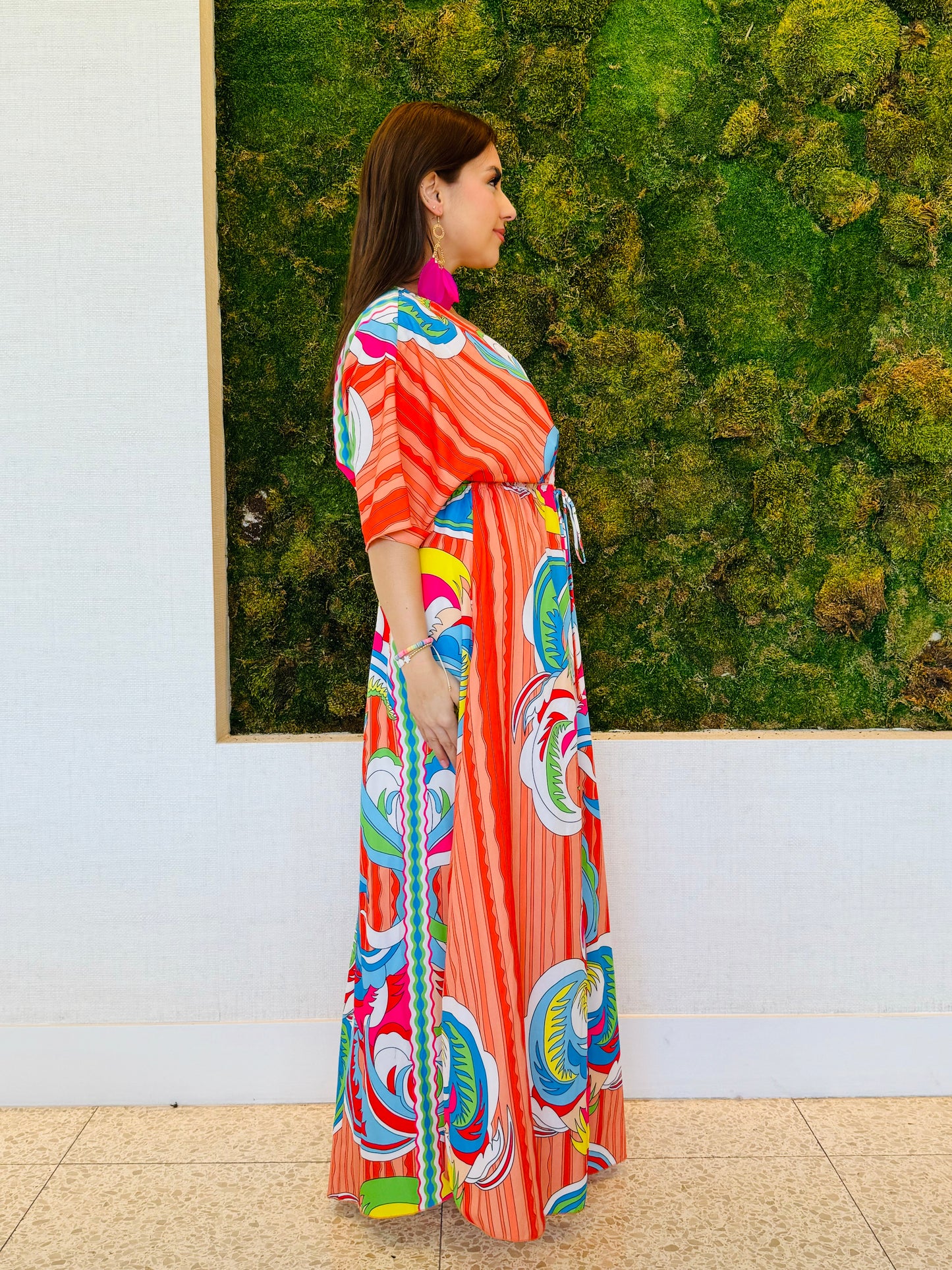 Raquel A line V neck maxi dress in an abstract orange print