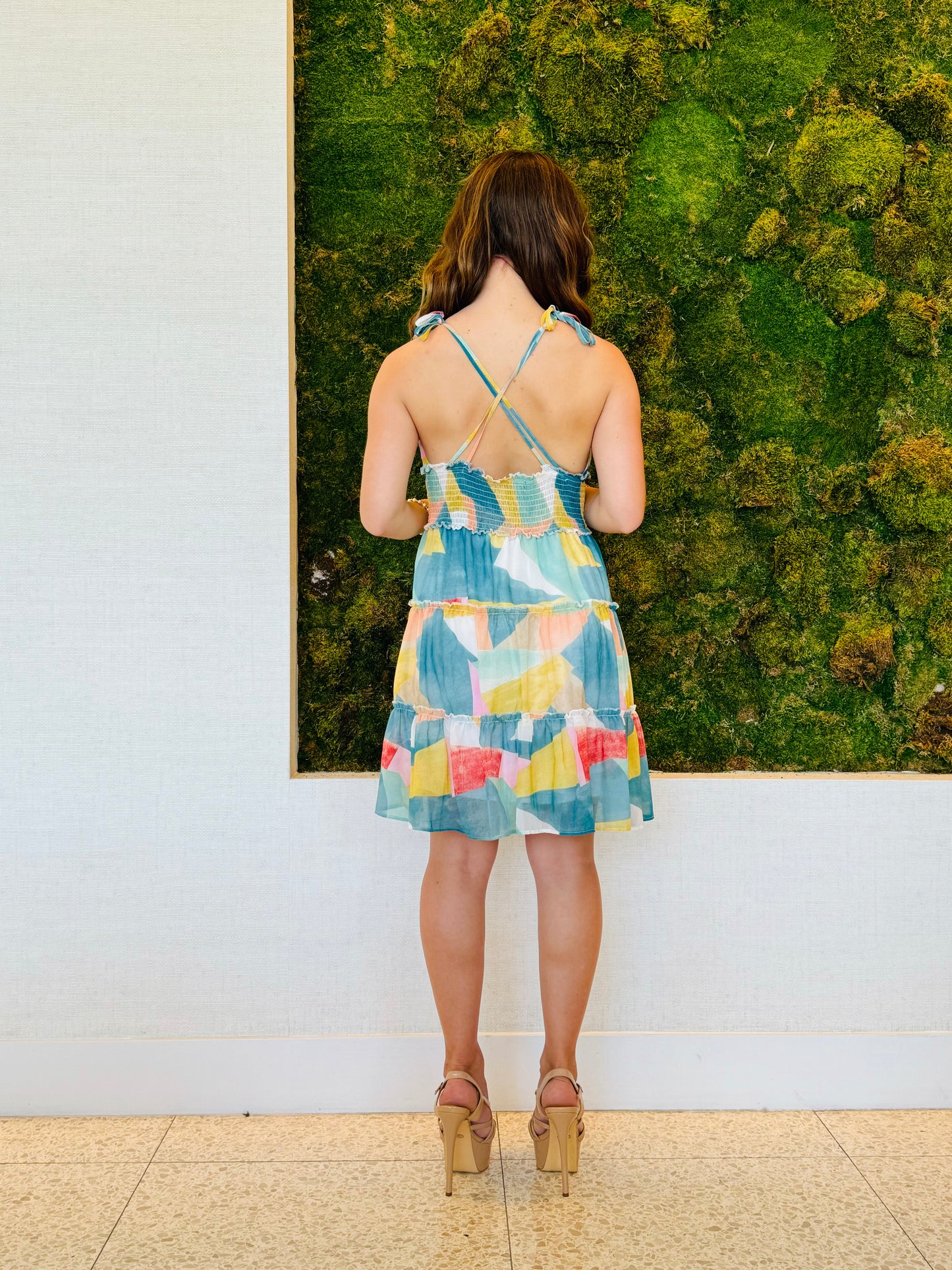 Elsie teal multi strap knee length dress with an elastic back