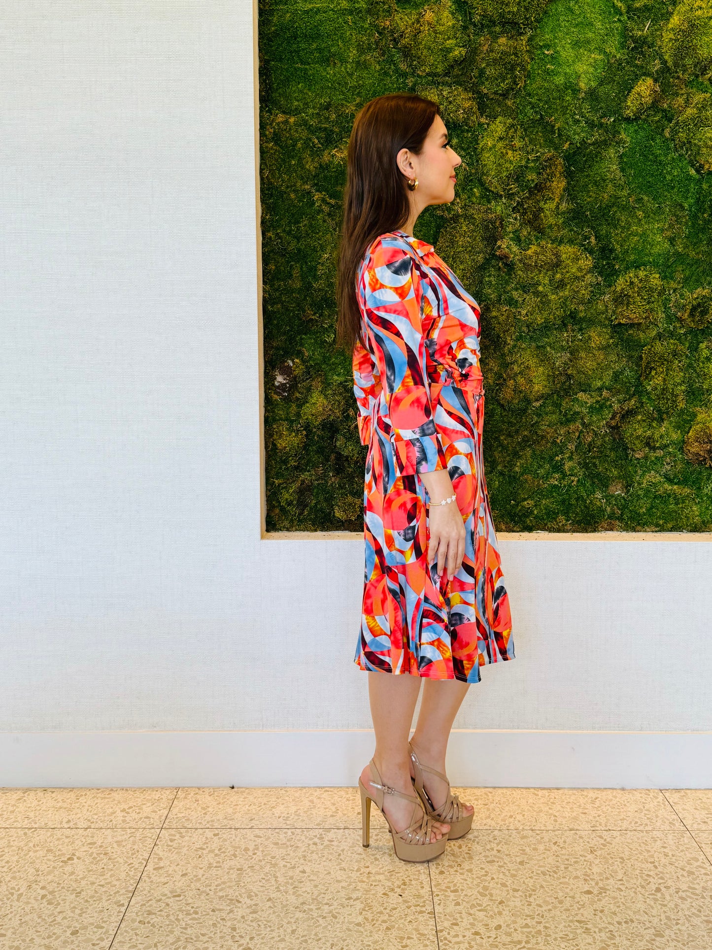 Cher faux wrap dress in an abstract orange print