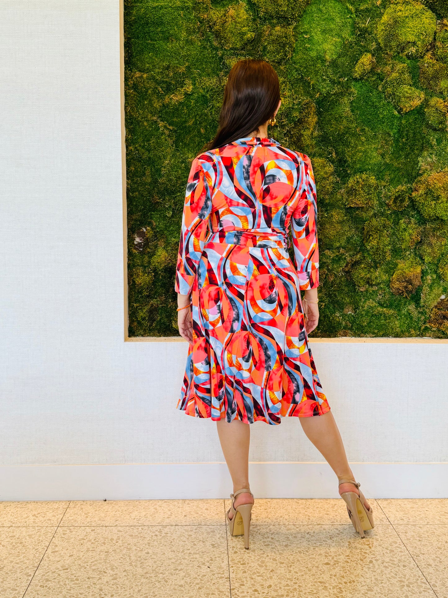 Cher faux wrap dress in an abstract orange print