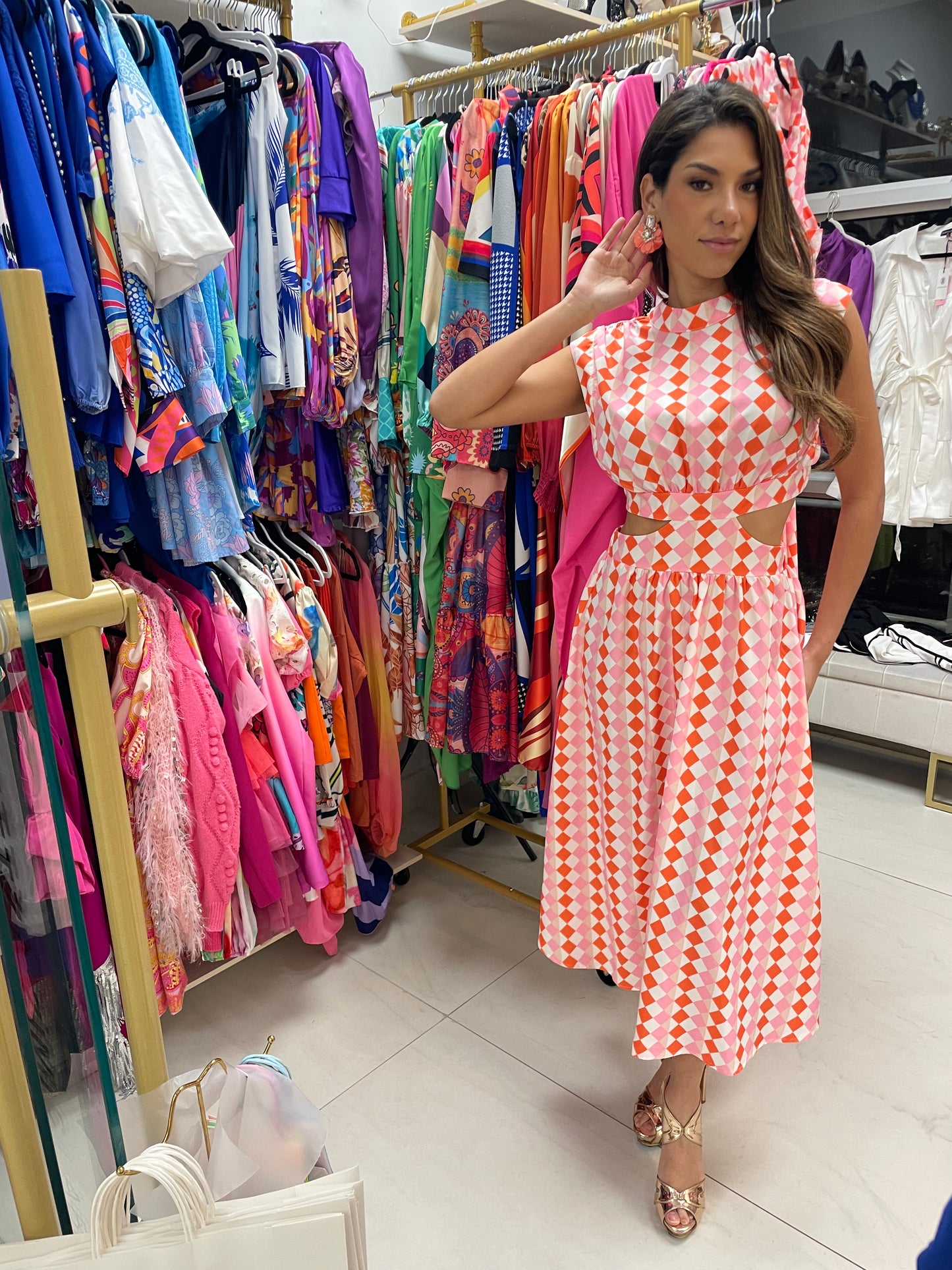 Savanna cut out retro print in asymmetrical print in orange and pink midi dress