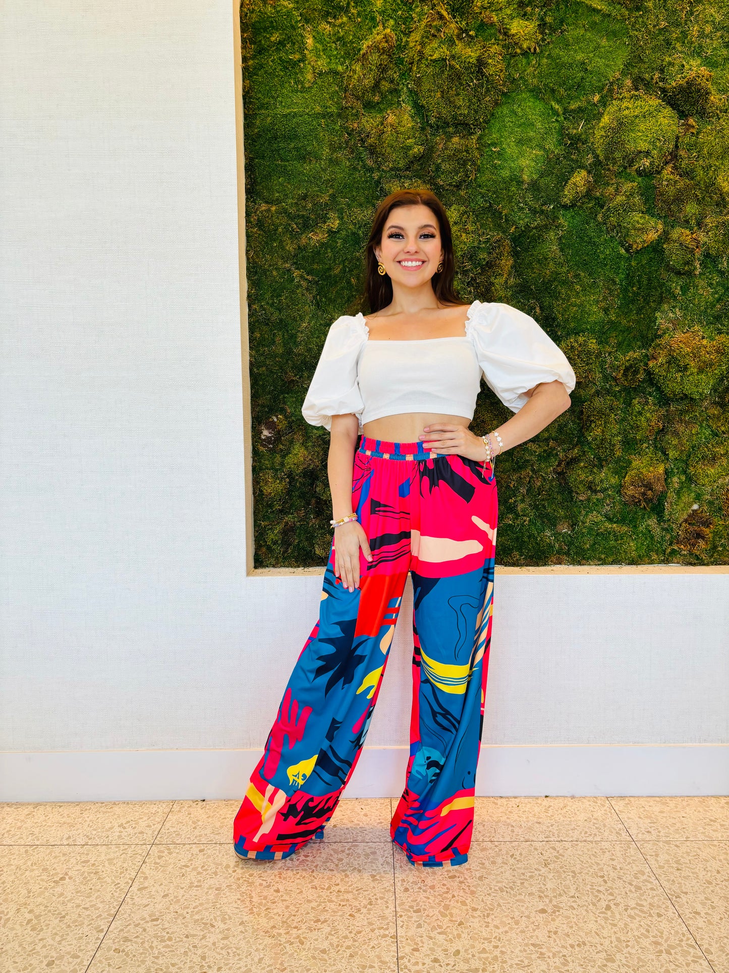 Daliah pants in a red, blue and black print