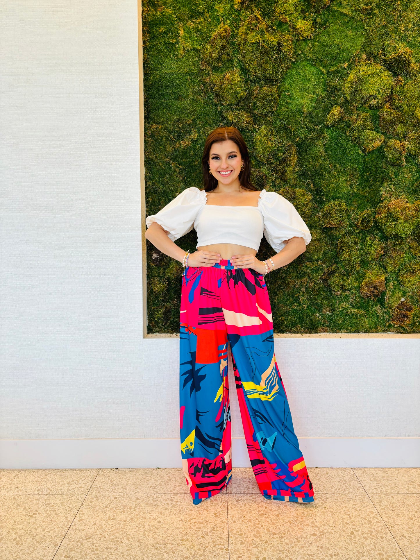 Daliah pants in a red, blue and black print