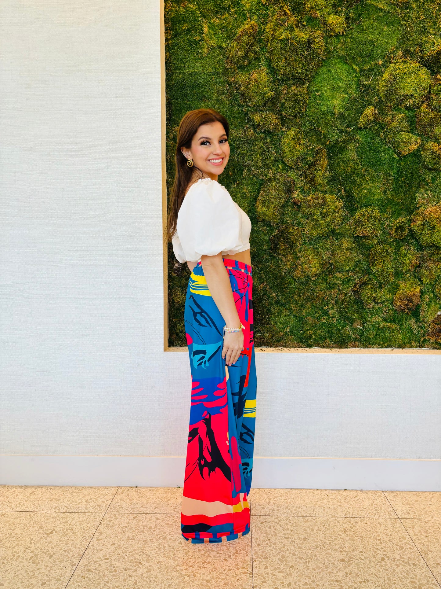 Daliah pants in a red, blue and black print