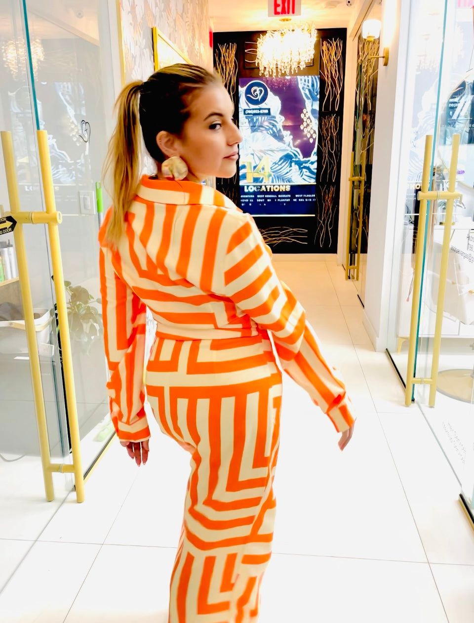 Melania orange print wrap dress